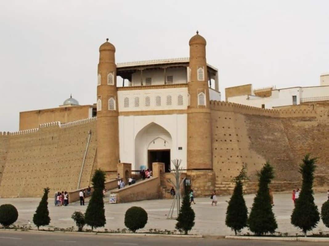 Colossal curved mudbrick bastions of the Ark fortress in Bukhara