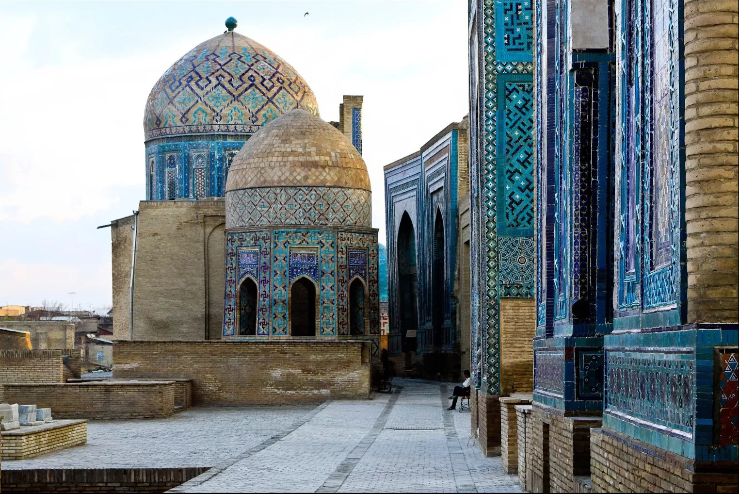 Traveler admiring the turquoise domes of Samarkand